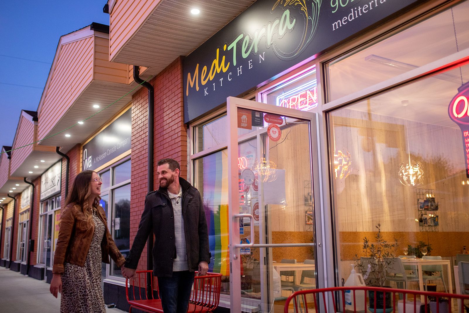 Couple walking into MediTerra Kitchen