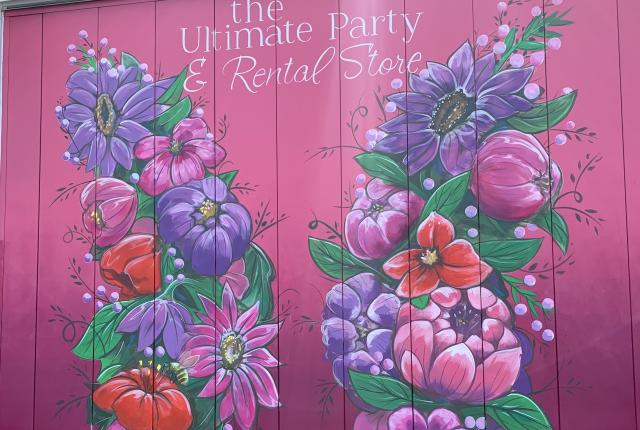 Pink butterfly floral mural.