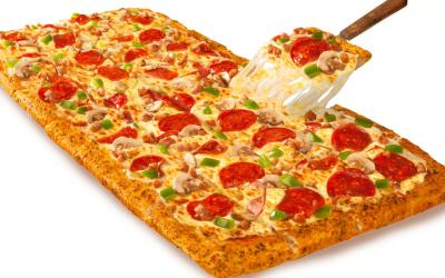 A slice being pulled out of a Greco pizza.